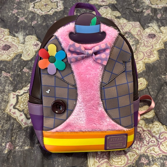 Loungefly Other - Loungefly Pink and Purple Kids Backpack with Bow Tie